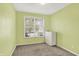 Bedroom with a window, dresser, carpet, and light-colored walls at 6241 Colonial Dr, Whitestown, IN 46075