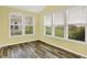 Sunny sun room with many windows and natural light, offering a serene space to relax and unwind at 6241 Colonial Dr, Whitestown, IN 46075