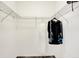 Walk-in closet with white walls, wire shelves and a black cardigan at 6241 Colonial Dr, Whitestown, IN 46075