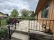 Back patio with wrought iron railings, ideal for outdoor relaxation and entertaining at 645 Boulder Rd, Indianapolis, IN 46217