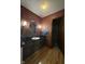 Traditional bathroom featuring a sink vanity, and decorative wall pattern, creating a unique space at 645 Boulder Rd, Indianapolis, IN 46217