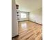 Bright bedroom featuring wood-look floors and a window, offering a comfortable living space at 645 Boulder Rd, Indianapolis, IN 46217