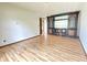 Spacious living room with hardwood floors and a large built-in display cabinet at 645 Boulder Rd, Indianapolis, IN 46217