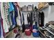 Organized walk-in closet with shelving, rods, storage bins and multiple storage options at 6738 Fox Club Ln, Brownsburg, IN 46112
