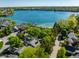 Gorgeous lakefront community with access to a private beach and multiple boat docks. Beautiful landscaping at 7849 Clearwater Cove Dr, Indianapolis, IN 46240