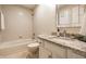 Clean bathroom featuring a single sink vanity, tub and shower combo at 7849 Clearwater Cove Dr, Indianapolis, IN 46240