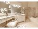 Bright bathroom vanity with granite countertops, a glass shower and a soaking tub at 7849 Clearwater Cove Dr, Indianapolis, IN 46240