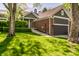 Charming brick home with an attached garage and meticulously landscaped front yard at 7849 Clearwater Cove Dr, Indianapolis, IN 46240