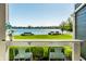 Charming view of the lake from the house with a serene landscape at 7849 Clearwater Cove Dr, Indianapolis, IN 46240