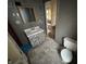 Bathroom featuring sink with tiled vanity and a toilet at 811 N Oxford St, Indianapolis, IN 46201