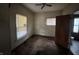 Bedroom with two windows with blinds and an open doorway at 811 N Oxford St, Indianapolis, IN 46201