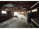 Garage interior with empty space and unfinished walls at 811 N Oxford St, Indianapolis, IN 46201