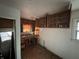 Bright kitchen with open layout, classic wood cabinets, and space for dining and entertaining at 811 N Oxford St, Indianapolis, IN 46201