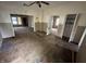 Open-concept living room featuring ceiling fan and multiple doorways at 811 N Oxford St, Indianapolis, IN 46201
