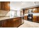 Modern kitchen featuring granite countertops, stainless steel appliances, and wood cabinets at 8269 S Midnight Dr, Pendleton, IN 46064