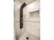 Tile shower features a rainfall shower head and a built-in toiletry shelf at 8269 S Midnight Dr, Pendleton, IN 46064