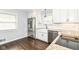 Modern kitchen featuring stainless steel appliances, white cabinets, and granite countertops at 8606 N Washington Blvd, Indianapolis, IN 46240