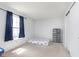 Bedroom features carpet flooring, a window with curtains, and a wardrobe organizer at 8709 Orchard Grove Ln, Camby, IN 46113