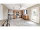 Bright eat-in kitchen features stainless appliances, light oak cabinetry, and a ceiling fan at 8709 Orchard Grove Ln, Camby, IN 46113