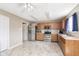 Spacious eat-in kitchen features stainless appliances and light oak cabinetry at 8709 Orchard Grove Ln, Camby, IN 46113