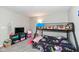 Cozy bedroom featuring bunk beds, soft lighting, and playful decor at 8811 Dorill Creek Ln, Indianapolis, IN 46259