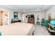 Bright main bedroom with sitting area and plenty of storage in dressers and closets at 8811 Dorill Creek Ln, Indianapolis, IN 46259