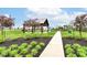 Community park with a picnic pavilion, playground, and beautiful landscaping for Gathering fun at 8811 Dorill Creek Ln, Indianapolis, IN 46259