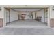Spacious garage with concrete flooring and ample storage space at 948 Peppermill Run, Greenwood, IN 46143