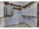 Walk-in closet has built-in shelving and hanging rods at 948 Peppermill Run, Greenwood, IN 46143