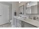 Charming bathroom with double sinks, framed mirrors, and stylish gray cabinetry at 1015 Supernova Dr, Franklin, IN 46131