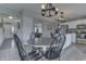 Cozy breakfast nook offering convenient access to the kitchen and views into the adjacent dining area at 1015 Supernova Dr, Franklin, IN 46131