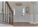 Inviting entryway features a bright white door, sidelights, and hardwood flooring at 1015 Supernova Dr, Franklin, IN 46131