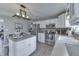 Inviting kitchen with ample counter space, stainless appliances, white cabinetry, and a central island at 1015 Supernova Dr, Franklin, IN 46131
