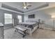 Serene main bedroom boasts trey ceiling, carpeted floors and neutral tones at 1015 Supernova Dr, Franklin, IN 46131