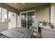 Relaxing screened porch featuring comfortable seating, a table, and views of the backyard at 1015 Supernova Dr, Franklin, IN 46131