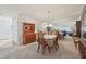 Bright dining room featuring mirrored wall at 1030 Stratford Hall # 17-3, Indianapolis, IN 46260
