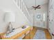 Welcoming foyer with a staircase and wood flooring at 1030 Stratford Hall # 17-3, Indianapolis, IN 46260