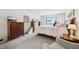 Well-lit main bedroom featuring plush carpet and large windows at 1030 Stratford Hall # 17-3, Indianapolis, IN 46260
