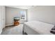 Comfortable bedroom with a simple bed, window, and minimal decor for a peaceful ambiance at 10358 Pronghorn Ln, Indianapolis, IN 46239