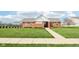 Community clubhouse featuring a welcoming entrance and well-manicured landscaping enhancing the neighborhood appeal at 10358 Pronghorn Ln, Indianapolis, IN 46239
