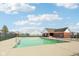 Community pool with ample space for swimming and relaxation, surrounded by well-maintained landscaping and fencing at 10358 Pronghorn Ln, Indianapolis, IN 46239