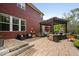 Beautiful backyard with a spacious patio, outdoor fireplace, ideal for relaxing and entertaining at 10531 Cleary Trce, Fishers, IN 46040