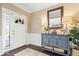 Inviting foyer with stylish console table, mirror, and elegant decor at 10531 Cleary Trce, Fishers, IN 46040