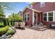 The home's patio has paved flooring, a dining set and greenery at 10531 Cleary Trce, Fishers, IN 46040