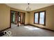 Comfortable living room with abundant natural light and decorative lighting at 113 1St St, Shelbyville, IN 46176