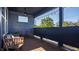 Inviting back porch with comfortable seating, string lights, and an open view at 1226 Cottage Ave, Indianapolis, IN 46203