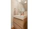 Stylish half bathroom featuring a modern vanity with sleek lines and a minimalist design at 1226 Cottage Ave, Indianapolis, IN 46203