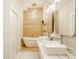 Stylish bathroom with a soaking tub, double vanity, and modern fixtures at 1226 Cottage Ave, Indianapolis, IN 46203