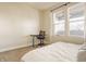 Comfortable bedroom with large windows, a ceiling fan, and a relaxing atmosphere at 1226 Cottage Ave, Indianapolis, IN 46203