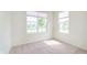 Bright bedroom with two windows providing ample natural light and a view of the neighborhood at 13204 Caterwood Cir, Fishers, IN 46037